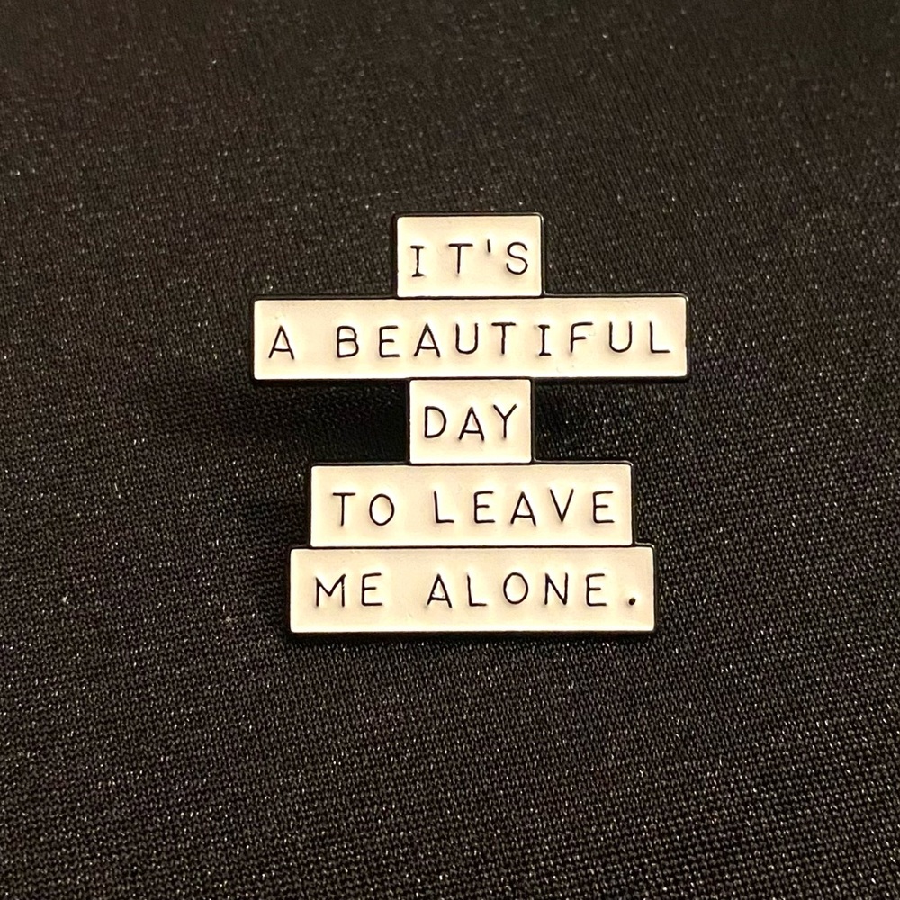Enamel pin/magnet starts off nicely enough, but takes a sharp turn
